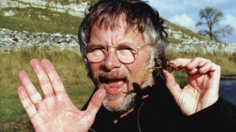 Bill Oddie holding a white-clawed crayfish in the Lake District