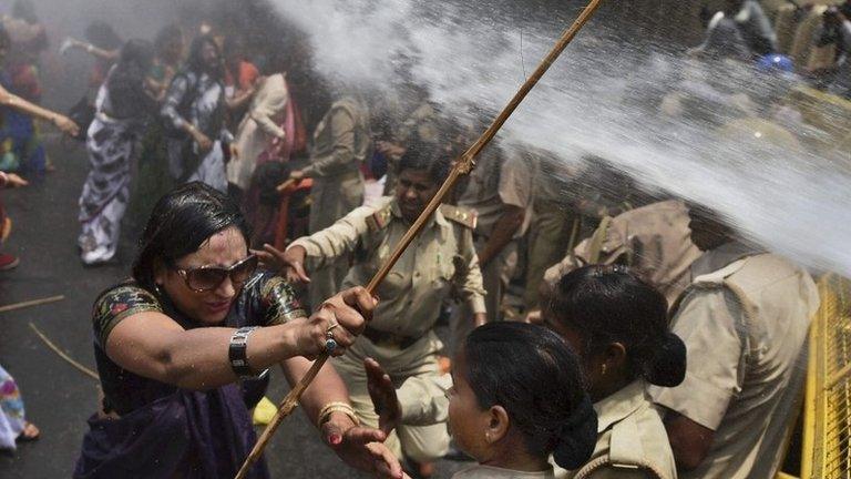 Protesters demonstrate outside the office of Uttar Pradesh's chief minister, demanding an end to attacks in Lucknow, India, 2 June 2014