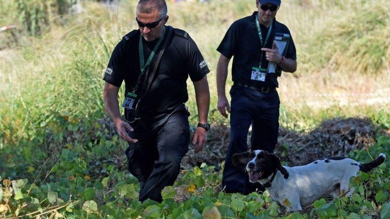 Police and sniffer dog