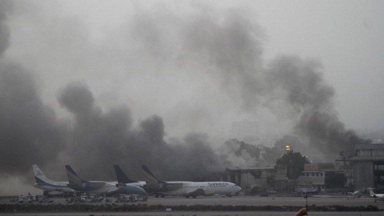 Smoke billows from Karachi airport (9 June 2014)