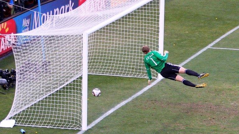 Manuel Neuer of Germany watches the ball bounce over the line from a shot from Frank Lampard