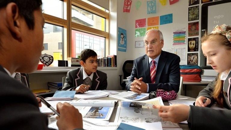 Sir Michael in a classroom