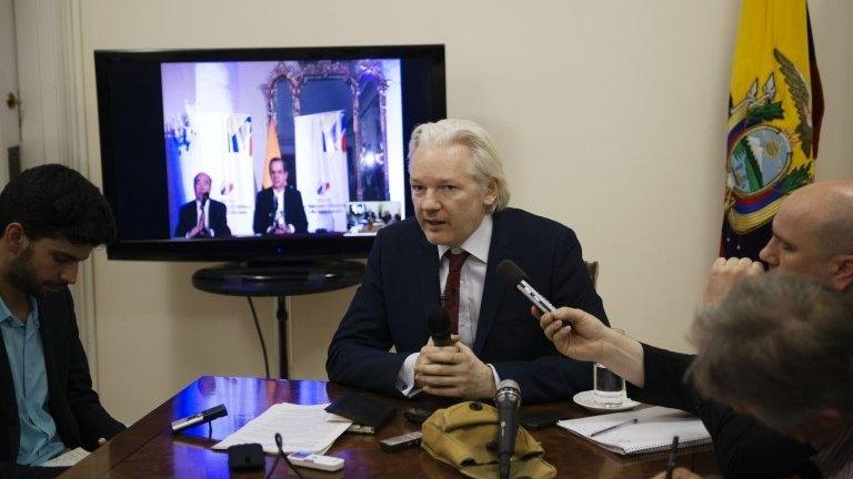 Julian Assange speaking to the media at the Ecuadorean embassy in London. 19/06/2014