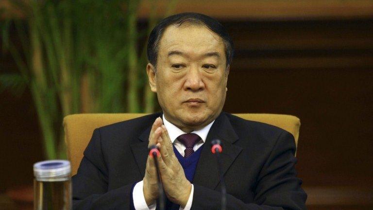 Then Communist Party Secretary of Jiangxi province, Su Rong attends a group discussion during the National People"s Congress in Beijing March 6, 2012.