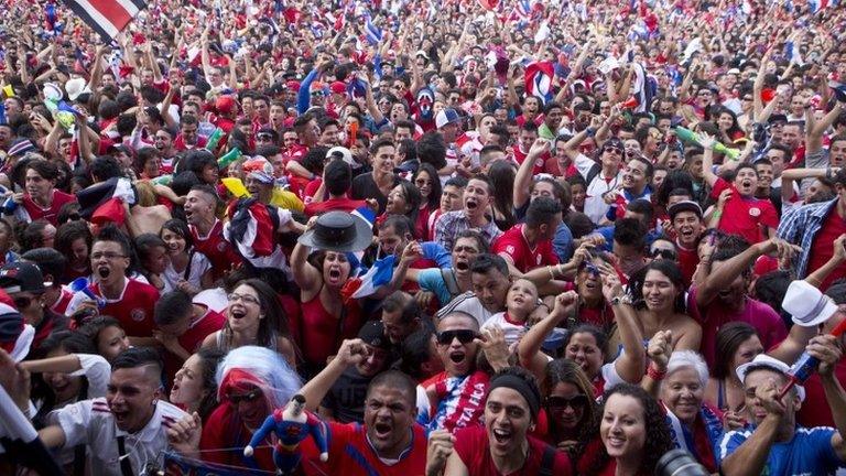 Costa Rica supporters celebrate victory in San Jose