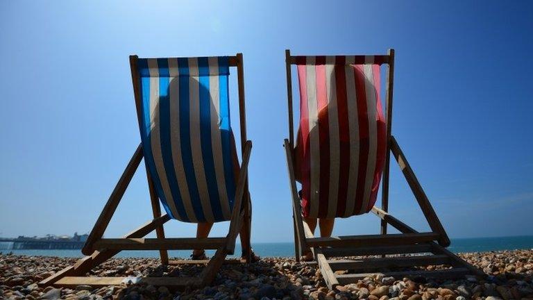 Deck chairs on Brighton beach