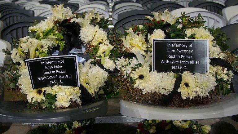 Wreaths in memory of John Alder and Liam Sweeney placed on seats