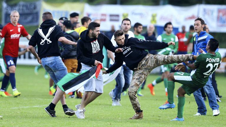 Pro-Palestinian protesters invade the pitch in Bischofshofen, Austria, 23 July