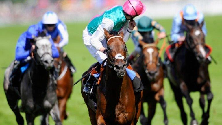 Jockey James Doyle, riding Kingman, celebrates winning the St James's Palace Stakes at Royal Ascot