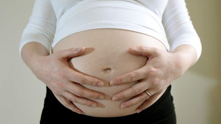 File photo a pregnant woman, 1 April 2014