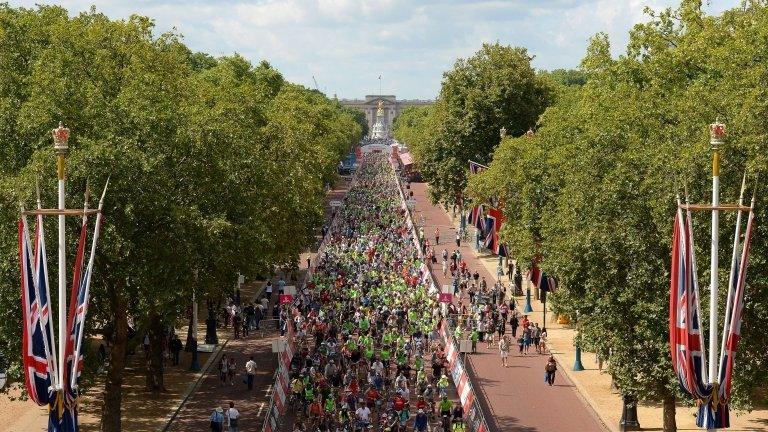 Cyclists make their way down The Mall from Buckingaham Palace towards Admiralty Arch in the Prudential RideLondon Freecycle along