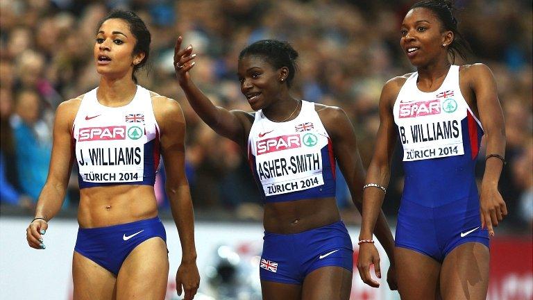 Silver medallist Jodie Williams is congratulated by Dina Asher-Smith and Bianca Williams