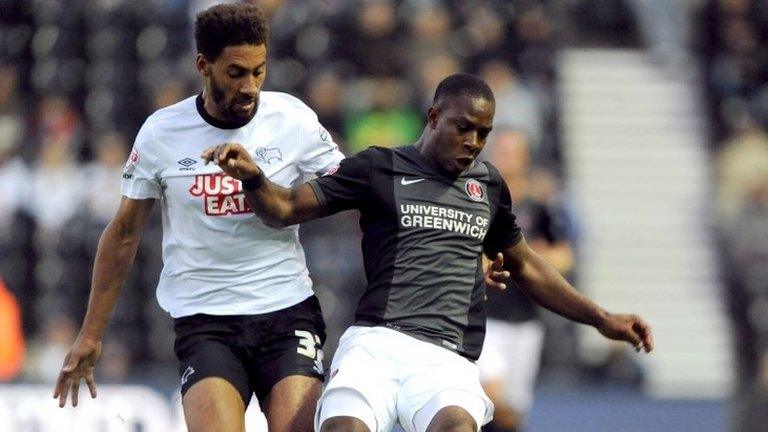 Derby County's Ryan Shotton (left) and Charlton Athletic's Franck Moussa battle for the ball