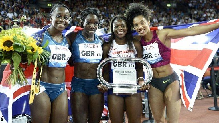 Great Britain team celebrates after winning the women's 4x100m relay