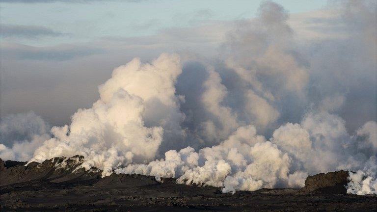 Steam rises over a fissure in a lava field north of the Vatnajokull glacier, which covers part of Bardarbunga volcano system - 29 August 2014