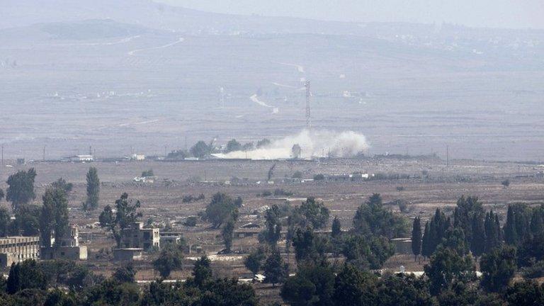 Smoke rises from a UN base in the Golan Heights demilitarised zone (1 September 2014)