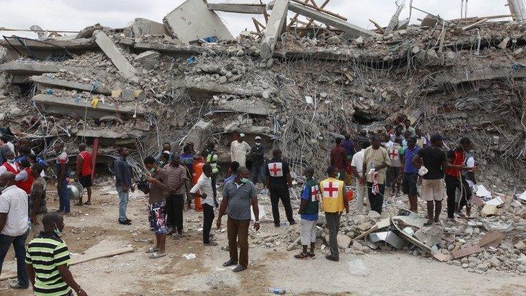 Rescue workers search for survivors in the rubble of a collapsed building belonging to the Synagogue Church of All Nations in Lagos on Saturday, 13 September.