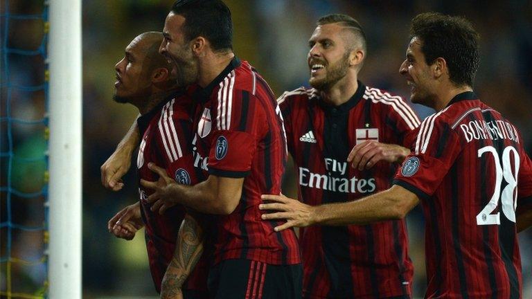 Nigel de Jong celebrates with teammates