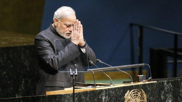 Narendra Modi bows after addressing the UN General Assembly in New York, 27 September