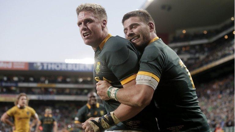 Jean de Villiers celebrates a try