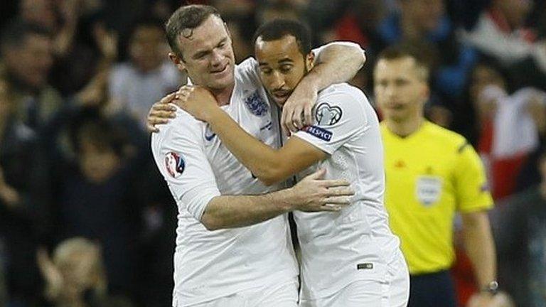 Wayne Rooney and Andros Townsend (right)