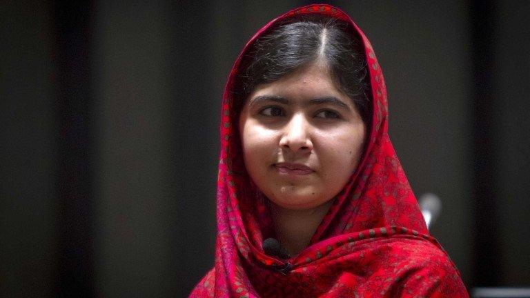 Pakistani schoolgirl activist Malala Yousafzai poses for pictures during a photo opportunity in