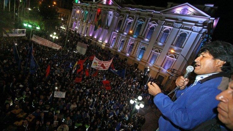 Evo Morales celebrates his victory in the presidential elections at the Government Palace in La Paz on 12 October 2014