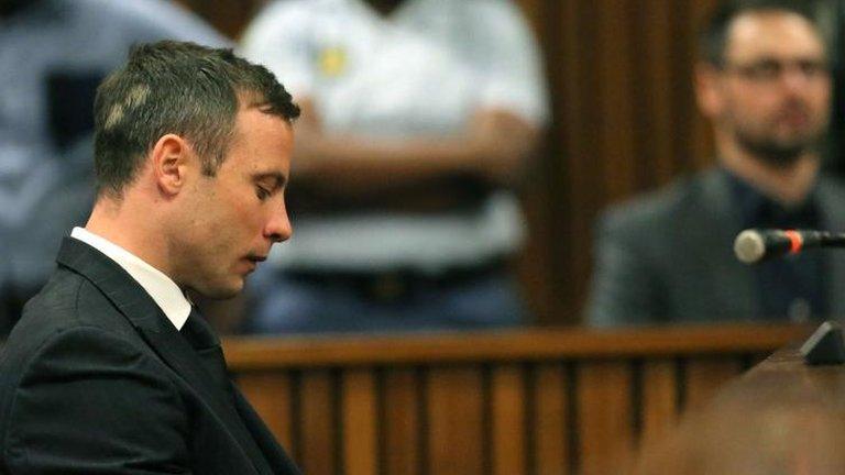 Oscar Pistorius arrives at the Pretoria High Court, 21 Oct