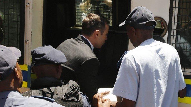 Pistorius gets into police van after leaving court - 21 October