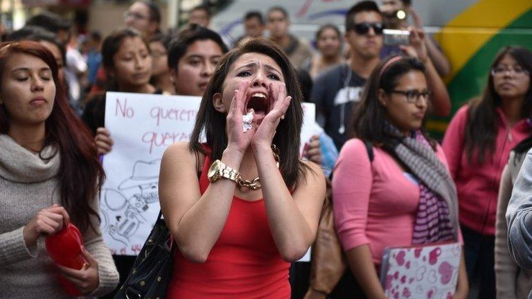 Relatives of the 43 trainee teachers protest