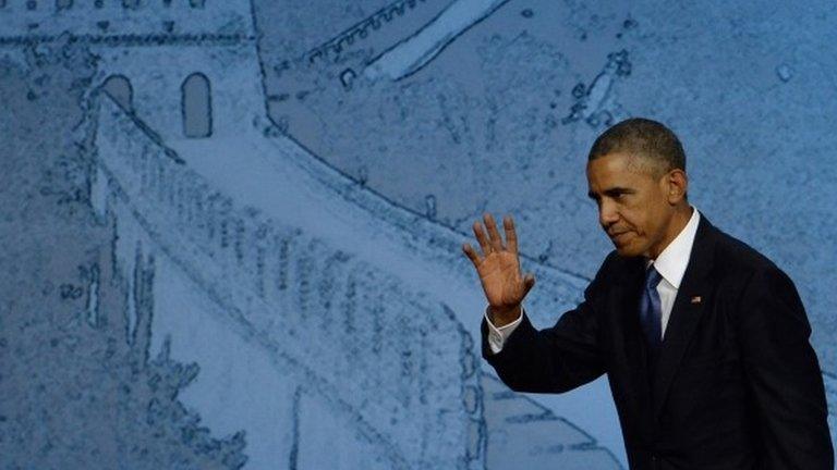 U.S. President Barack Obama waves after speaking at the APEC CEO Summit at the China National Convention Centre (CNCC) in Beijing 10 November 2014