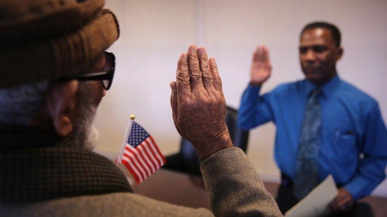 An immigrant took the US citizenship oath in Newark, New Jersey, on 20 November 2014