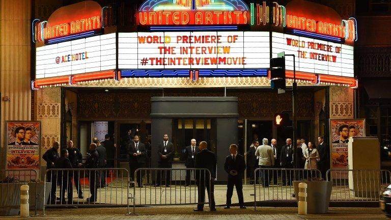 Security is seen outside The Theatre at Ace Hotel before the premiere of the film "The Interview" in Los Angeles, California, on 11 December 2014