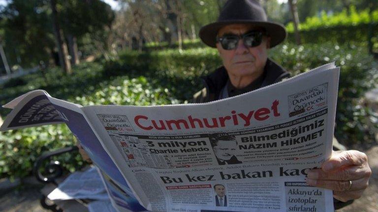 A man reads Cumhuriyet, the leading pro-secular Turkish newspaper, in Istanbul, Turkey, 14 January 2015