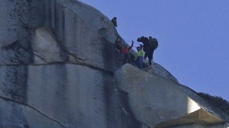 Climbers (in red and green) reach El Capitan's summit