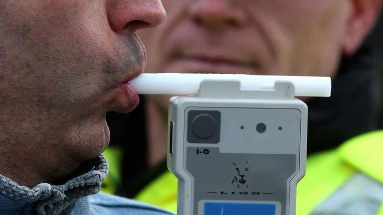 Man being breathalysed