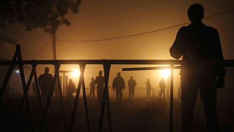 Pakistani soldiers patrol outside the central jail in Multan on January 7, 2015