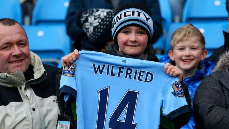 Manchester City fan with new Wilfried Bony top