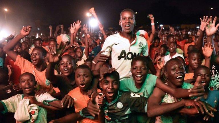 Ivory Coast fans celebrate winning the Africa Cup of Nations in the capital of Abidjan