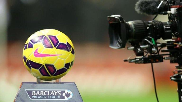 TV camera pointing at football