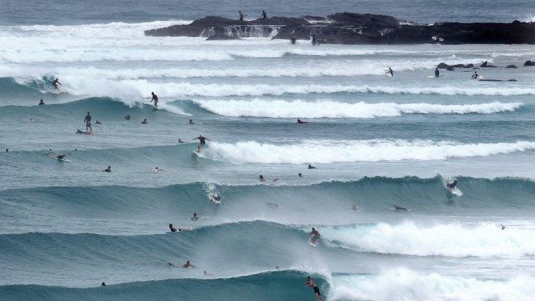 Surfers during Tropical Cyclone Marcia at Snapper Rocks on the Gold Coast (20 Feb 2015)