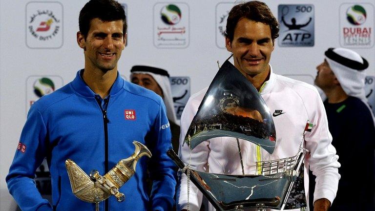 Roger Federer (R) of Switzerland and Novak Djokovic of Serbia