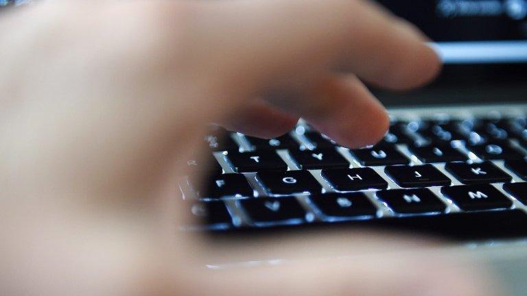 Hand on keyboard
