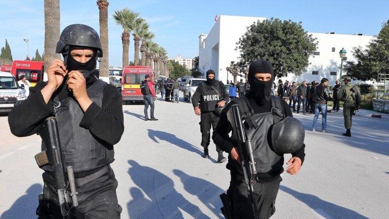 Members of the Tunisian security services stand outside the scene of the attack at the National Bardo Museum, Tunis, Tunisia, 18 March 2015