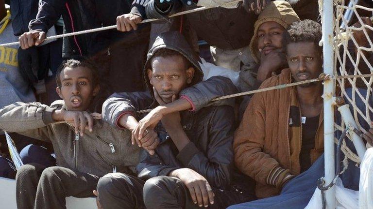 Migrants wait to disembark from an Italian ship in Salerno, Italy. Photo: 22 April 2015