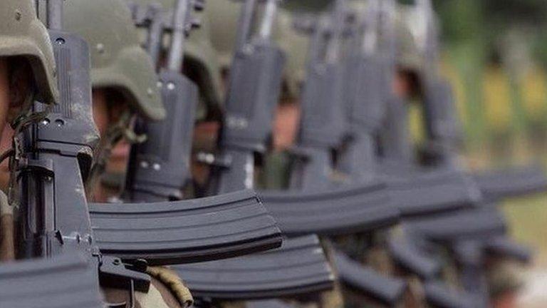 Colombian soldiers march in formation at Tres Esquinas, a military base deep in Colombias coca-growing Amazonian lowlands, on Wednesday, July 5, 2000.