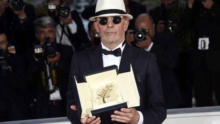 Director Jacques Audiard with the award, 24 May