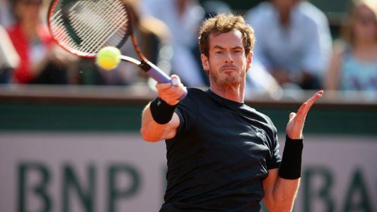 Andy Murray hits a return