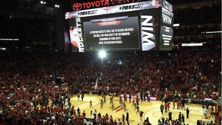 Fans stuck in Houston due to flash flooding