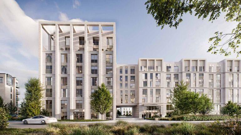 A architect's impression of a modern flat development about four storeys high. The building is grey and bordered by greenery including trees and grassy areas.